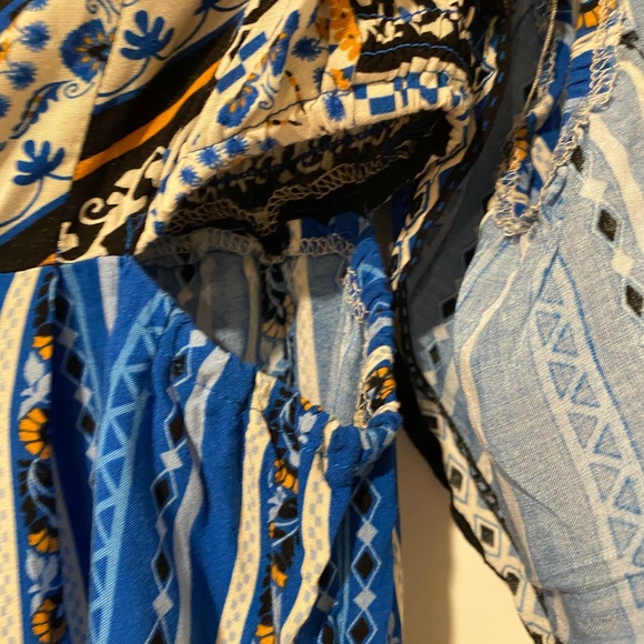 COPY - Off the shoulder Jumpsuit with side cut-outs - Picture 8 of 11